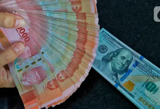 BI Pertahankan Suku Bunga, Rupiah Tertekan Dolar AS